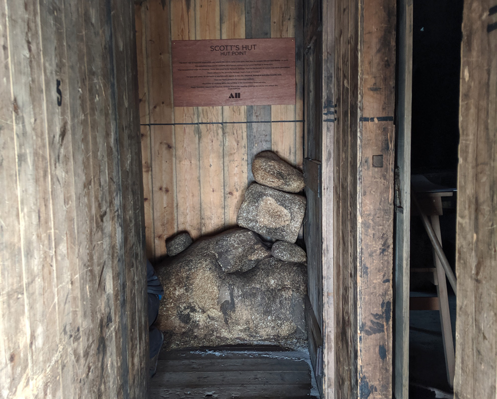 At the end of a narrow wooden corridor is a stack of dusty-looking rounded shapes which, on closer inspection, are made of cellulose material.